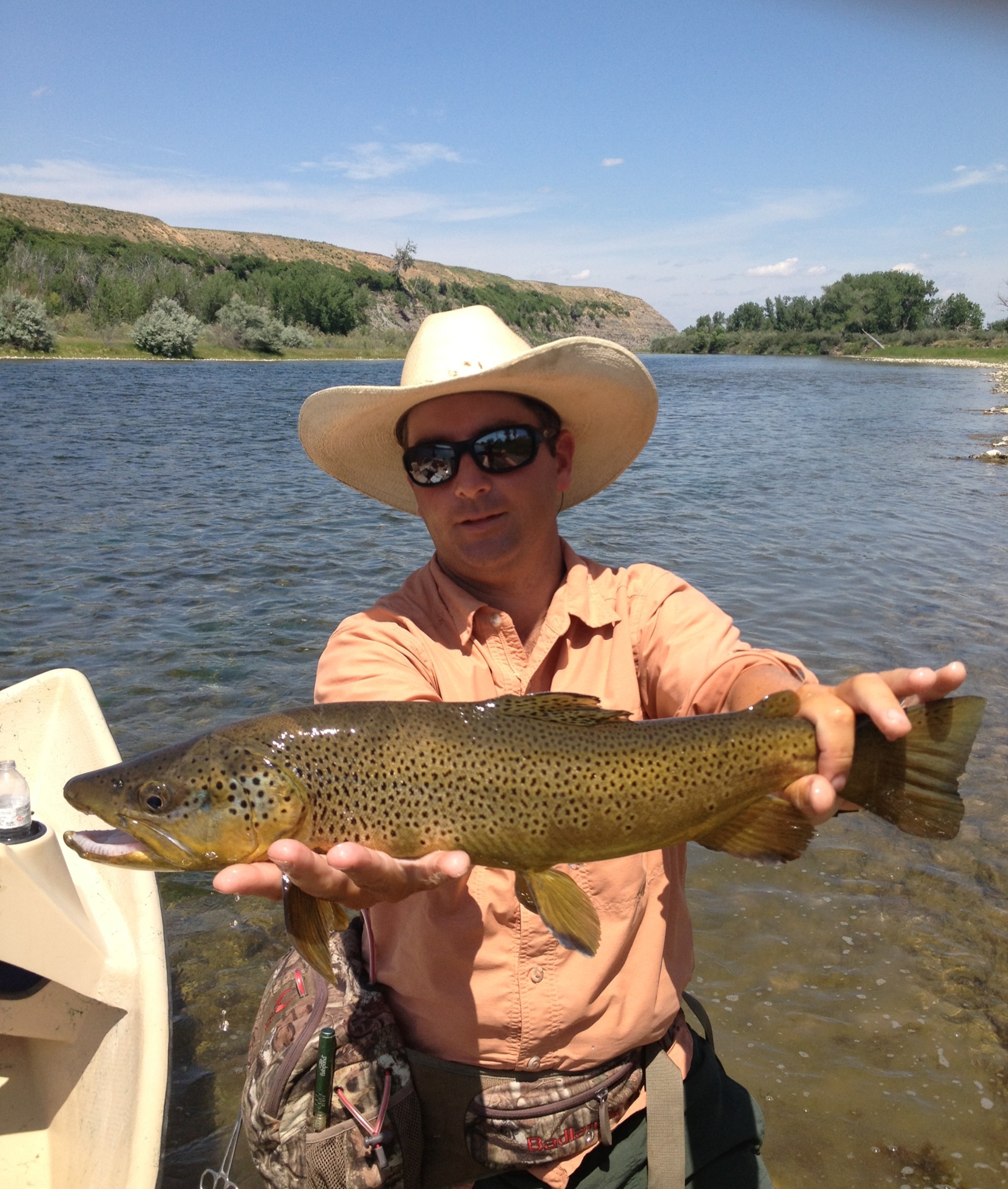 Guide Sam Boggio with a nice 22" Brown Trout. Montana Fly Fishing