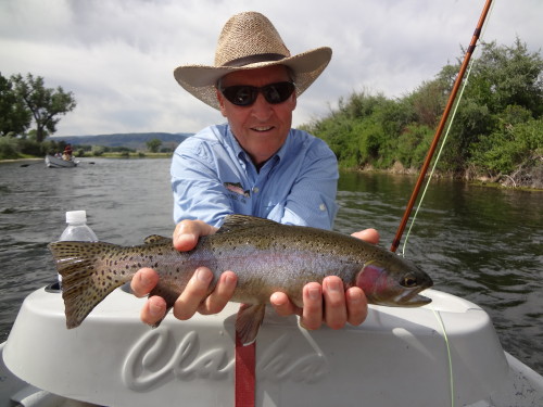 Doug on a beautiful June day with a gorgeous rainbow.