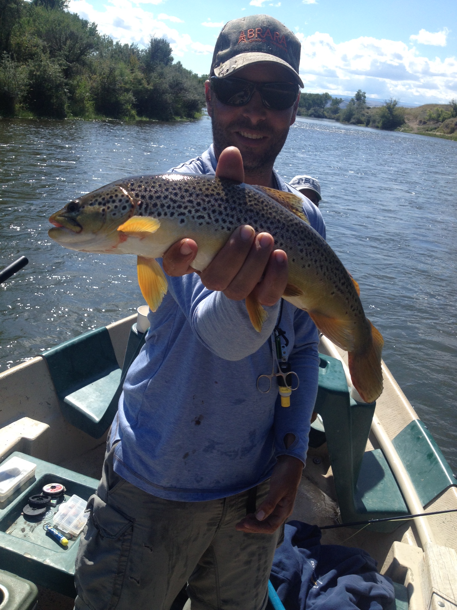 Holden holding Pat D's 20" brown trout. Nice job guys! Montana Fly Fishing & Bird Hunting